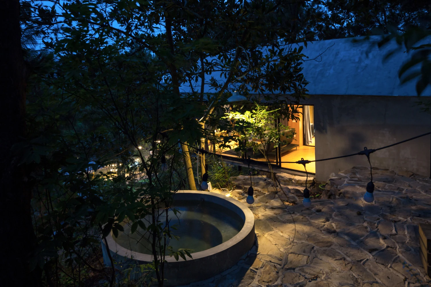 View of Forest House 02 from the exterior at dusk
