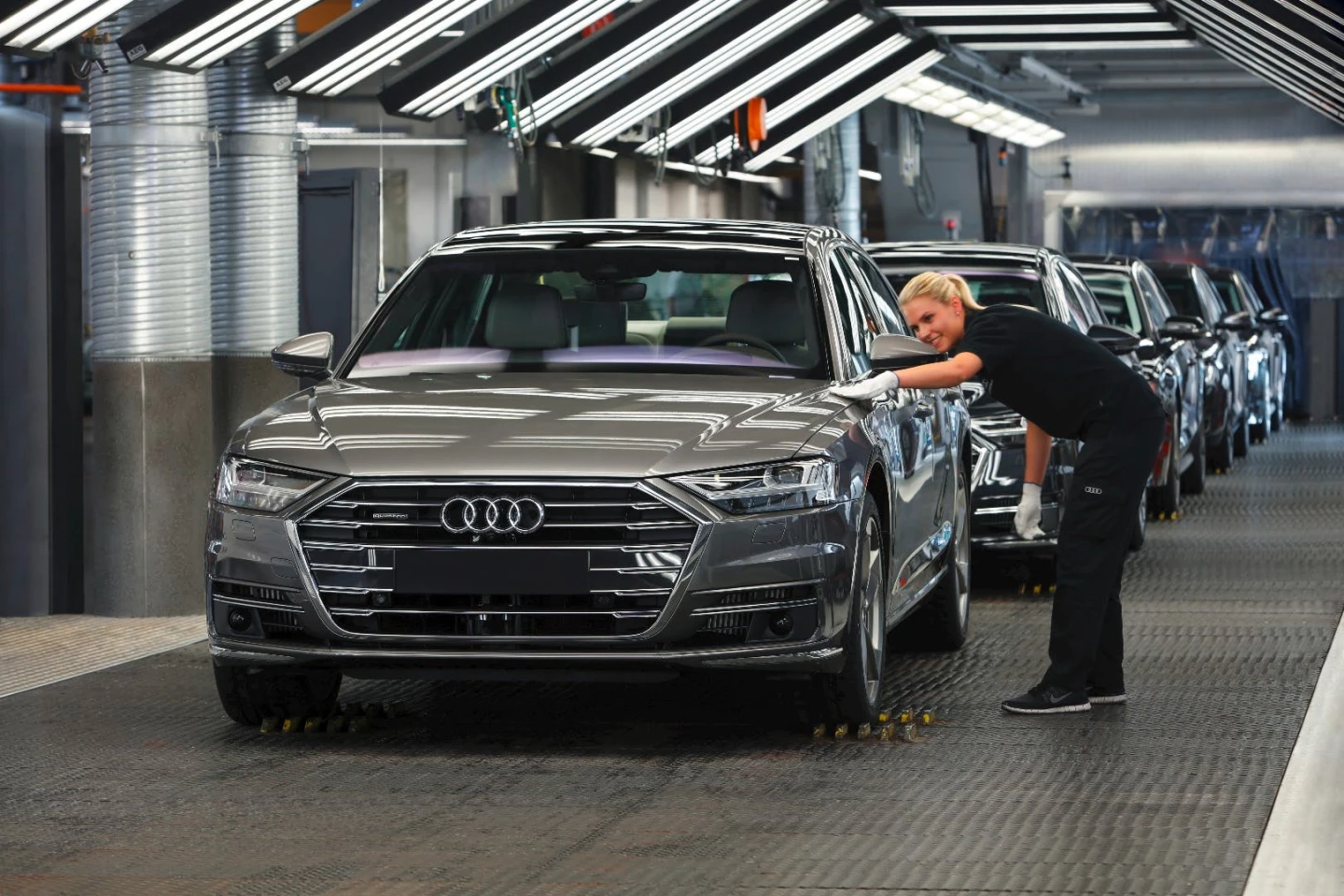 A grey Audi A8 rolls off the production line