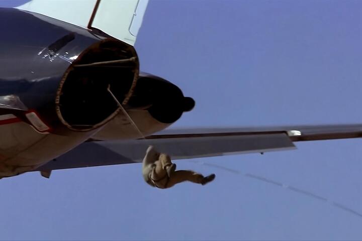 Simon Crane does what no one else will and slides down a steel cable attached from a McDonnell Douglas DC-9-32 to a Lockheed L-1329 JetStar at 150 mph – just above stall speed for the DC-9.