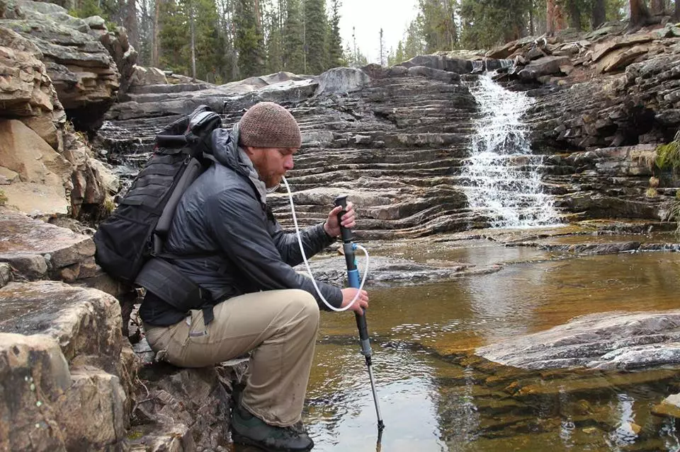 The PurTrek trekking pole/water purifier in use