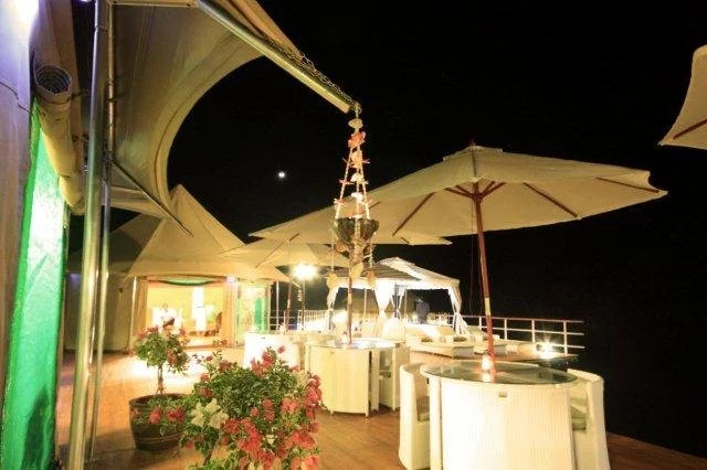 Enjoy a meal while listening to the sounds of the jungle