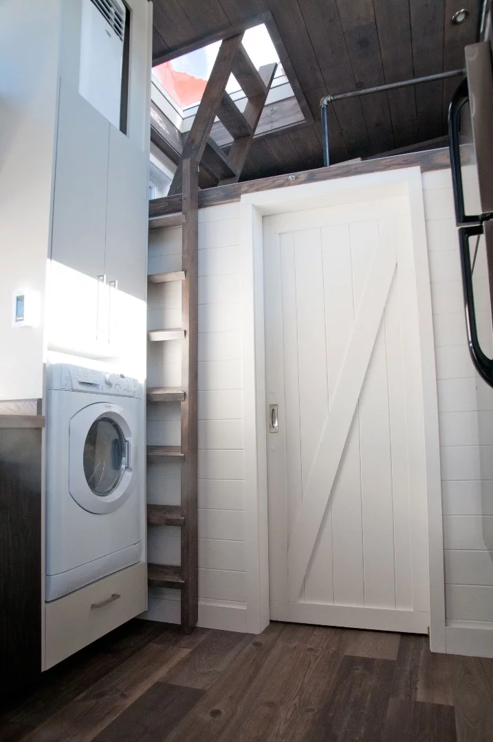 A pocket door leads to the Sakura's bathroom