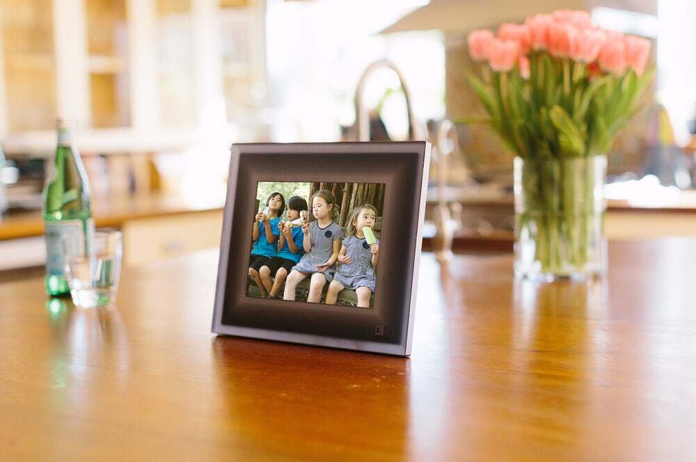 The Aura photo frame syncs to your phone automatically to cycle through images