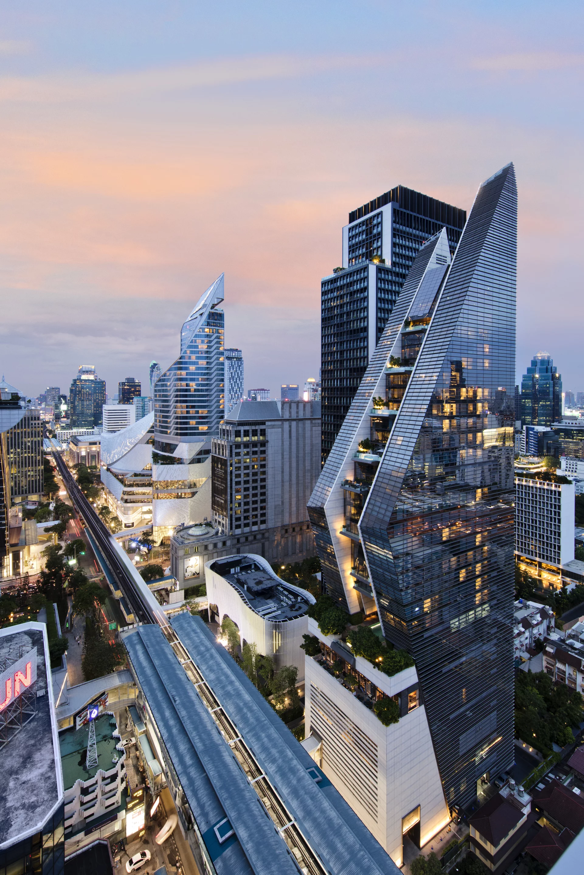 Rosewood Bangkok is located in Thailand and rises to a maximum height of 508 ft (154 m). It was designed by Kohn Pedersen Fox Associates and Tandem Architects. It came in at 10th place in the Emporis Skyscraper Award