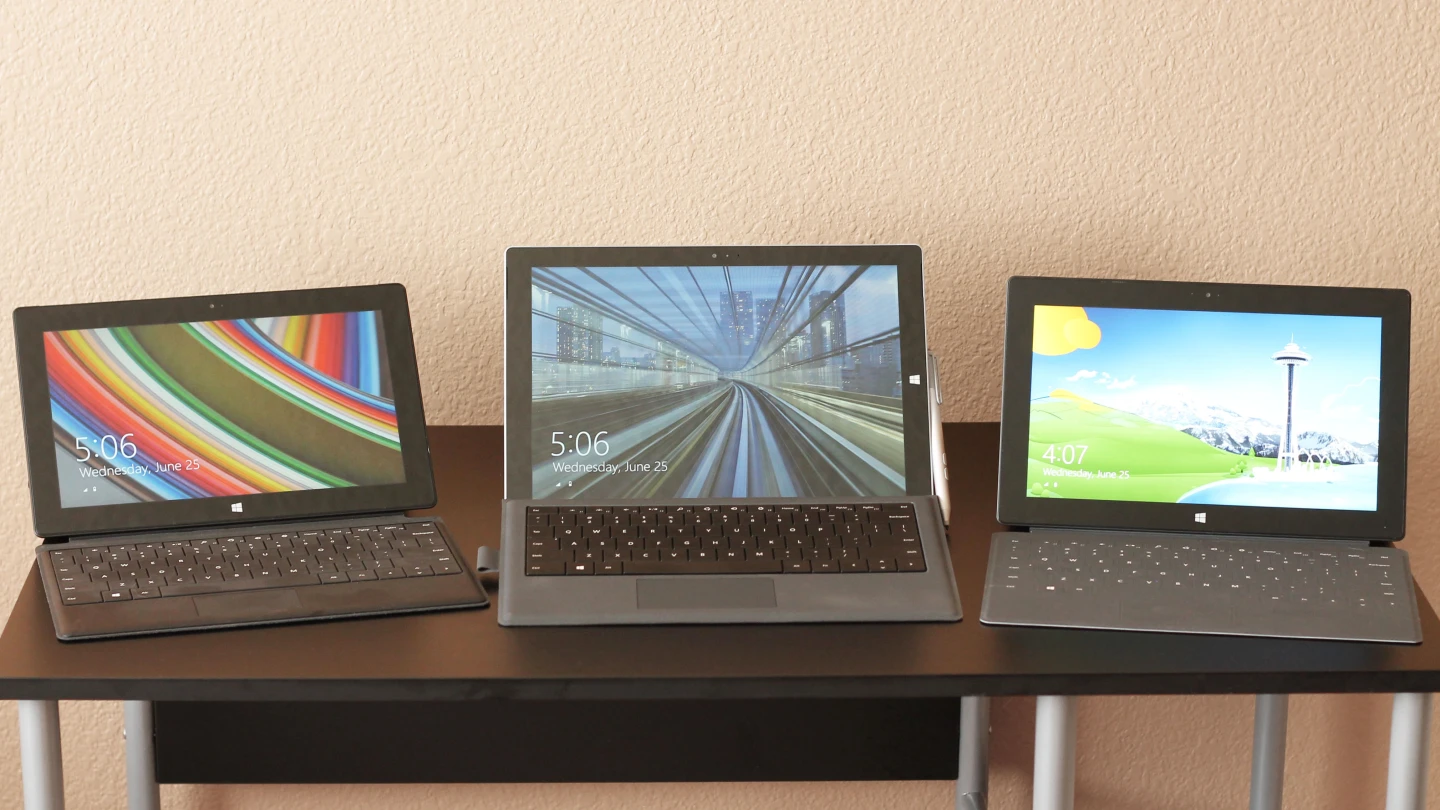 Surface Pro 3, center, flanked by the Pro 2 (left) and original Surface Pro (right)
