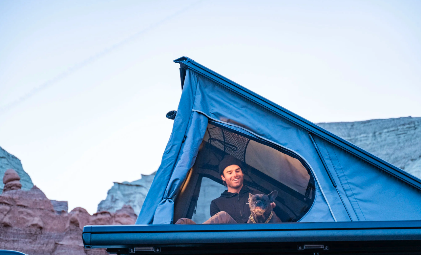 The rooftop tent comes standard, providing two more sleeping berths accessible directly from the lower van