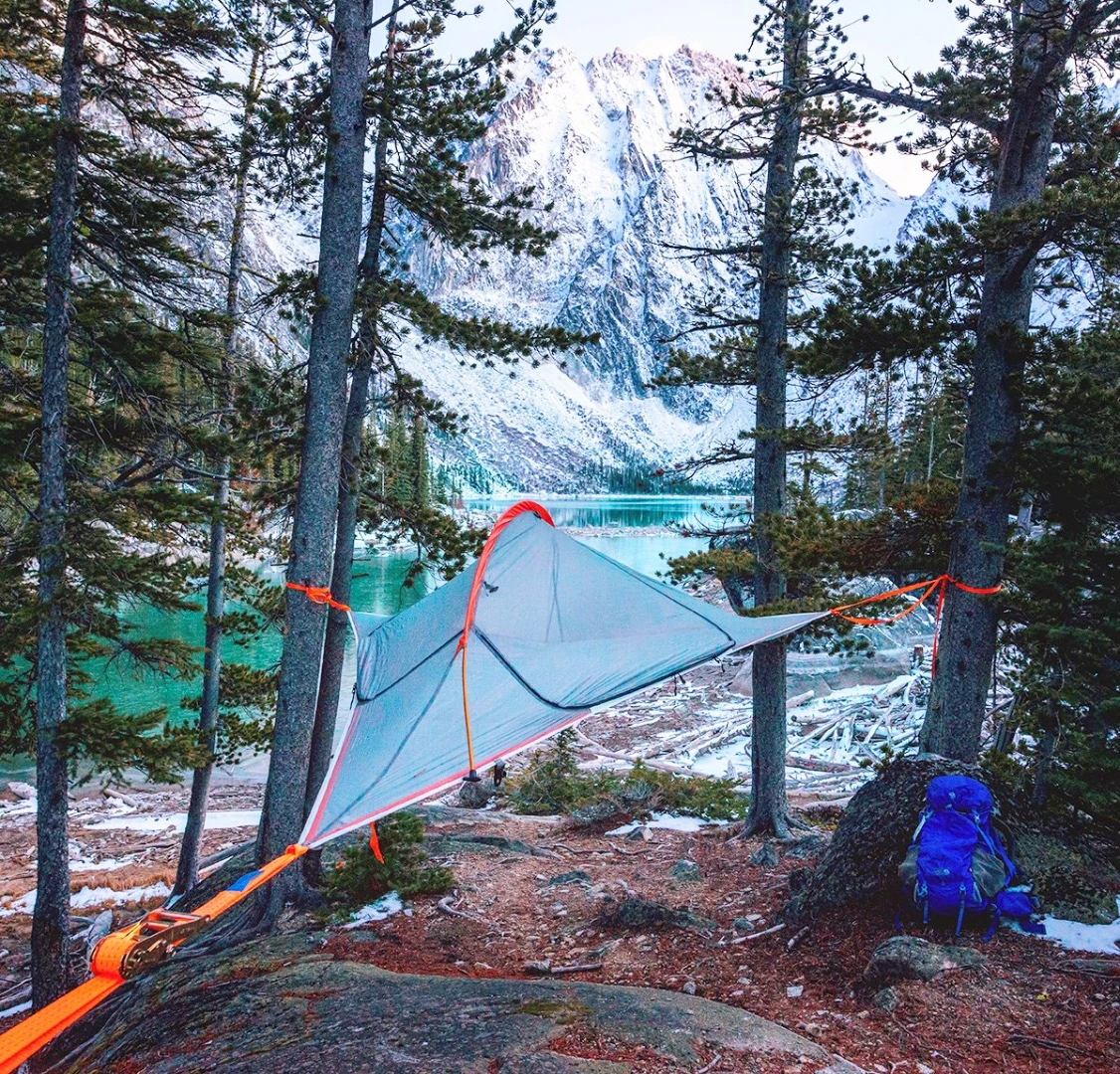 By hanging a tent from a tree, campers can escape all the creepy-crawlies, dampness, and rocks that are found on terra firma