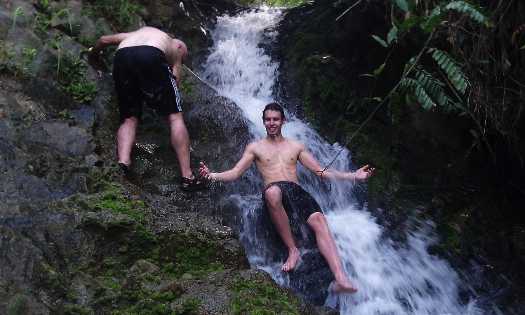 Climbing through the jungle then stopping to play in a mountain waterfall was one of the highlight experiences of the trip. That's father and son Collins, Geoff and Nick, frolicking together. Once we were entirely off the grid, the median age of the group decreased to around twelve years of age.