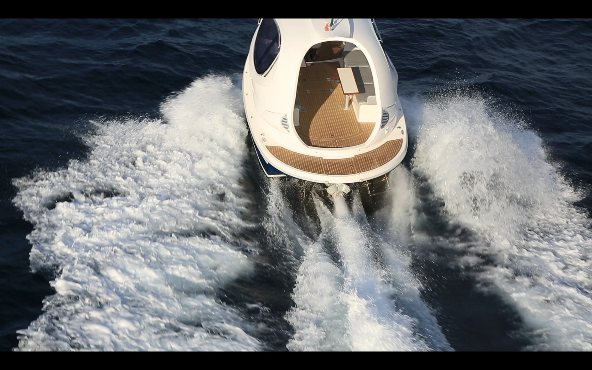 The craft features a rear diving platform