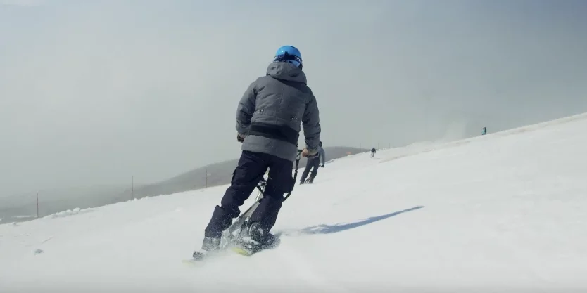 A Snogo rider hits the mountain