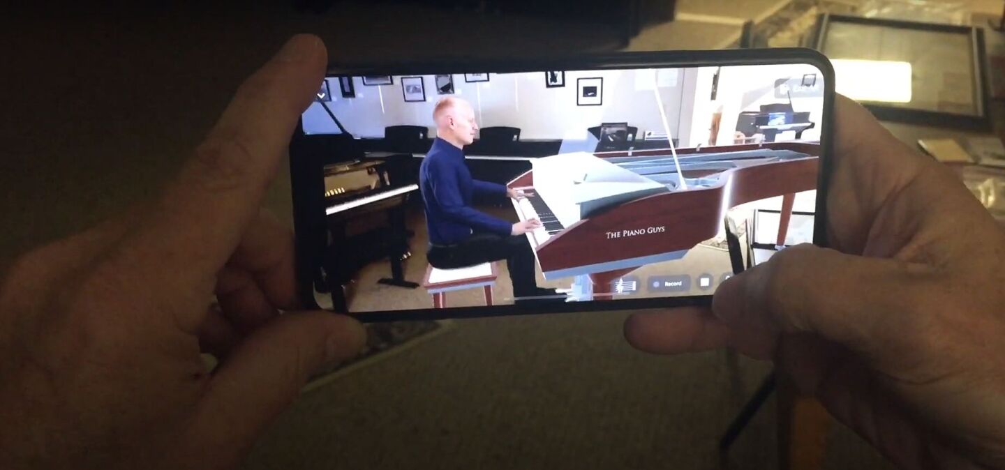 If there's no real piano at home, the app can place Jon Schmidt at a virtual Yamaha C7 Neo concert grand