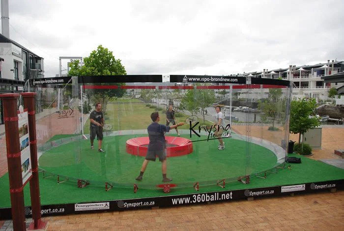 In the new racquet game of 360ball, players hit a ball into a central concave dish, trying to rebound it out of the reach of their opponents