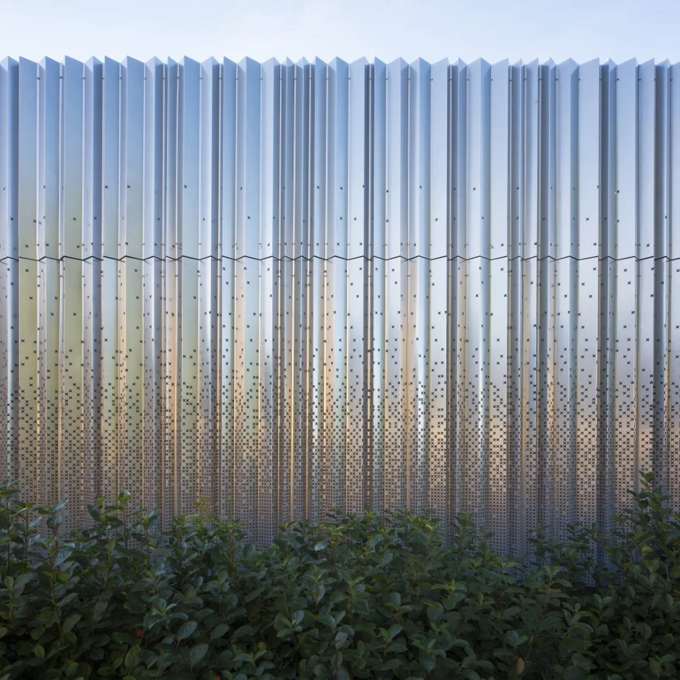 The steel cell structure has been covered with a series of impressive customized perforated aluminum sheets