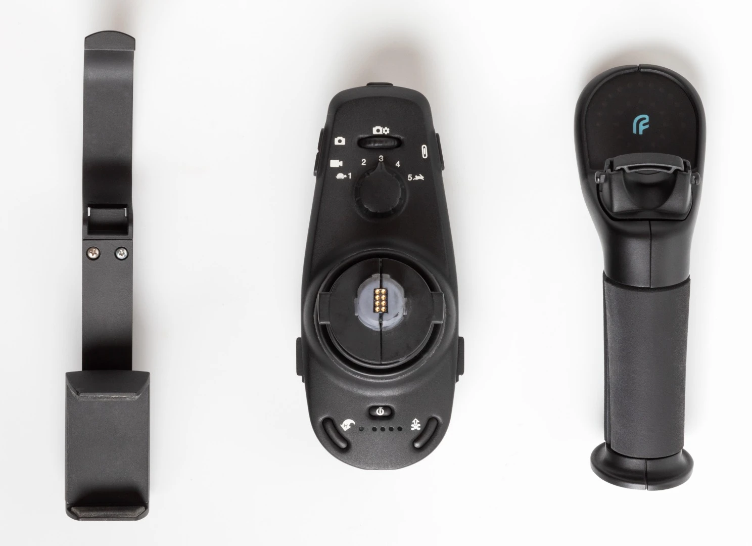 The three pieces of the FT Aviator – the phone holder, the base and the joystick