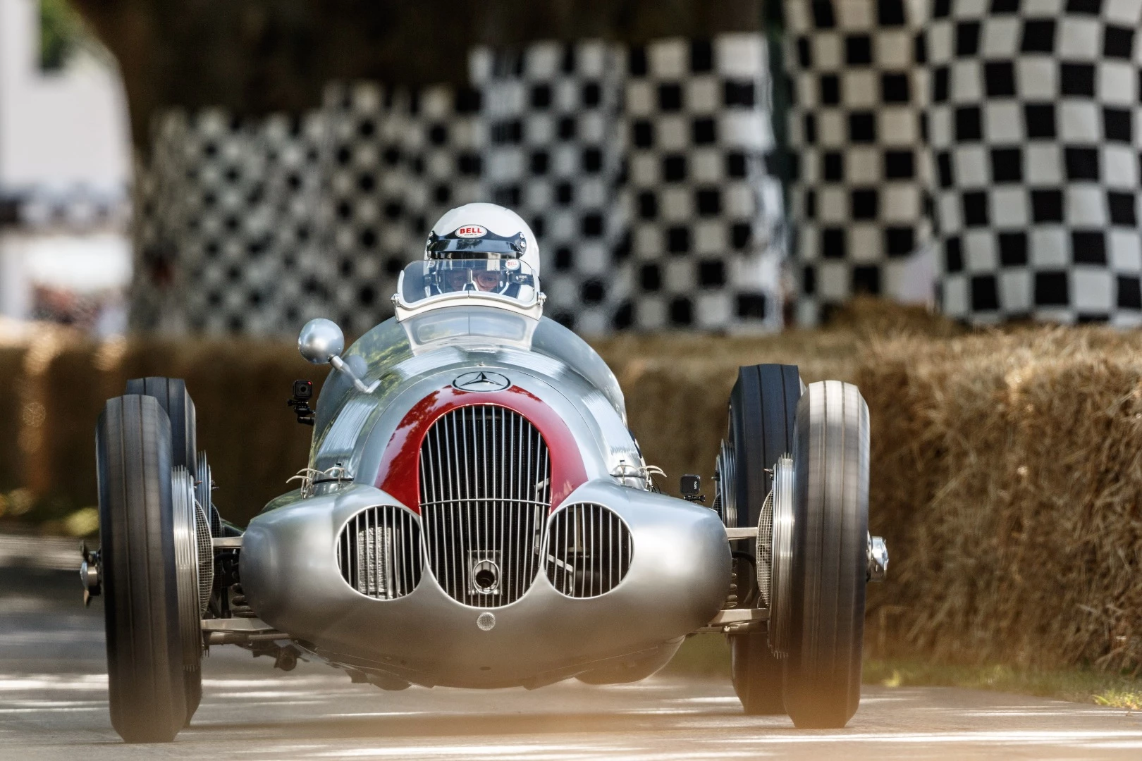 The legendary W125 Silver Arrows, running a lot of positive camber