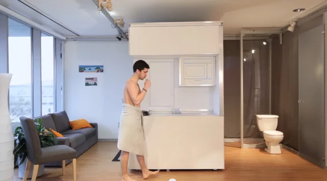 Touch controlled surfaces allow the CityHome unit to move back and forth a few feet, thus freeing up space in either the bathroom area or living room