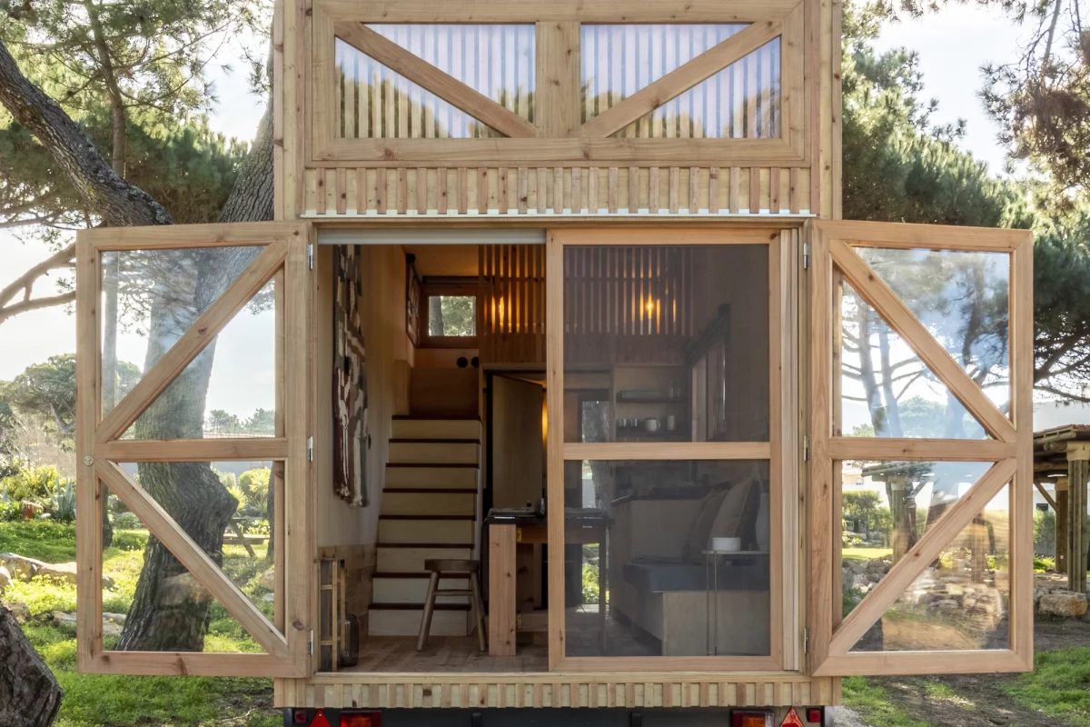 The Adraga's living room opens up to the outside with large double doors