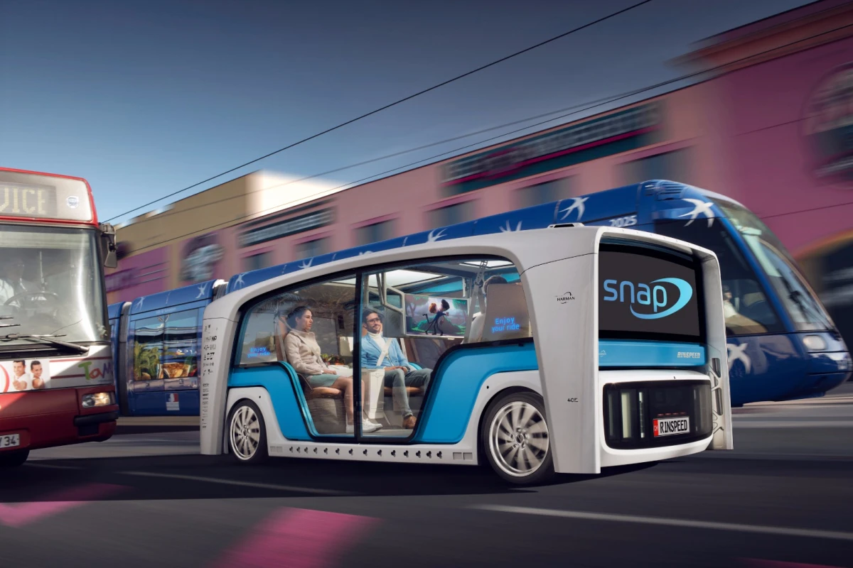 Inside Rinspeed's Snap pod is soft leather seating, storage space, wireless charging systems and a host of screens
