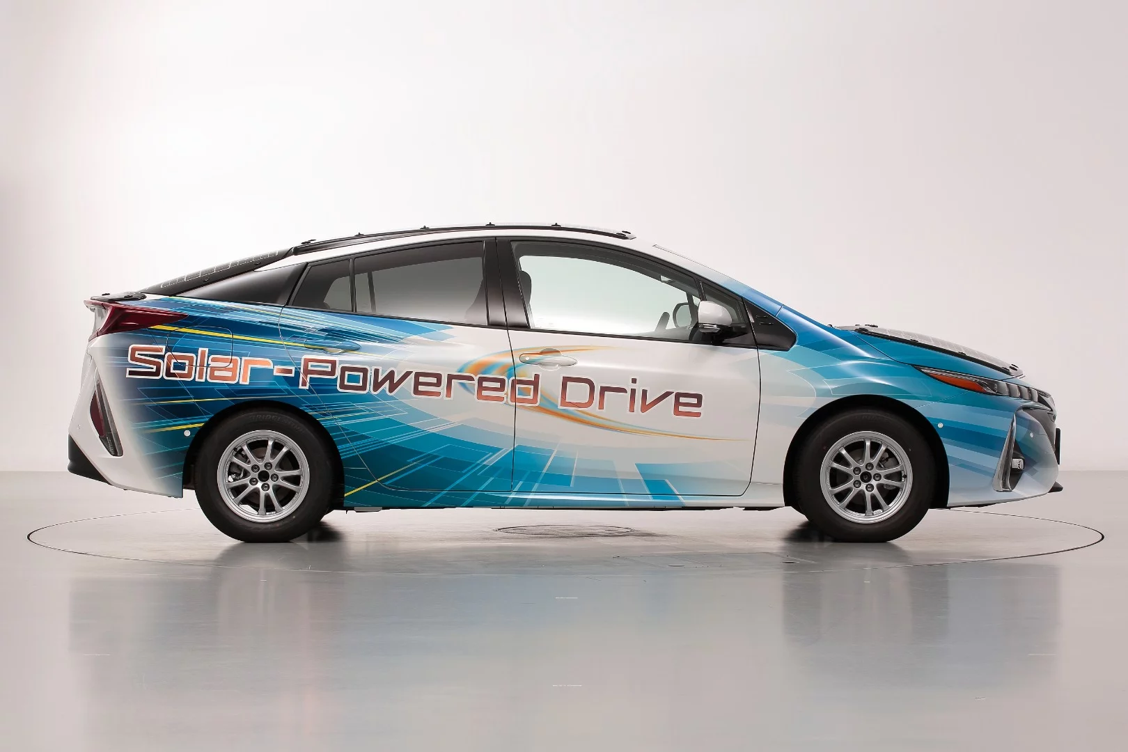 Toyota has fitted out an experimental version of its Prius with a fresh rooftop solar kit to explore the limits of sun-powered road travel