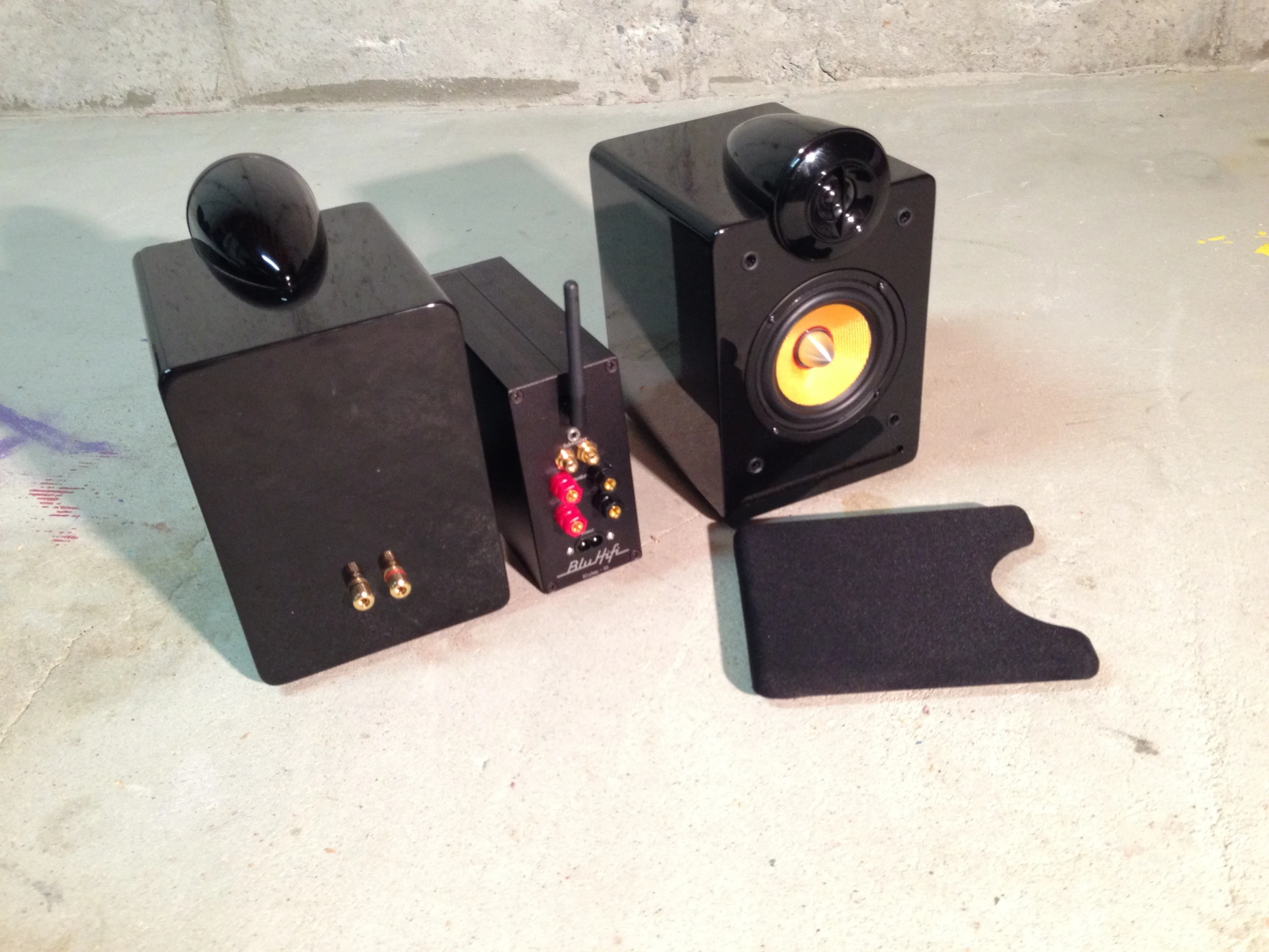 Each BluHifi bookshelf speaker has a 1-inch dome tweeter and 4-inch long-throw kevlar woofer