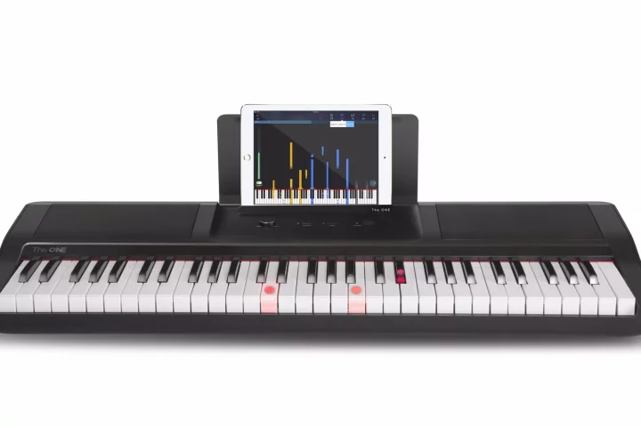 The One Smart Light Piano system teaches by lighting up the keys