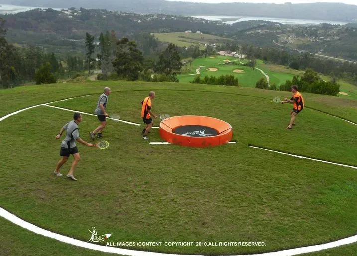 In the new racquet game of 360ball, players hit a ball into a central concave dish, trying to rebound it out of the reach of their opponents