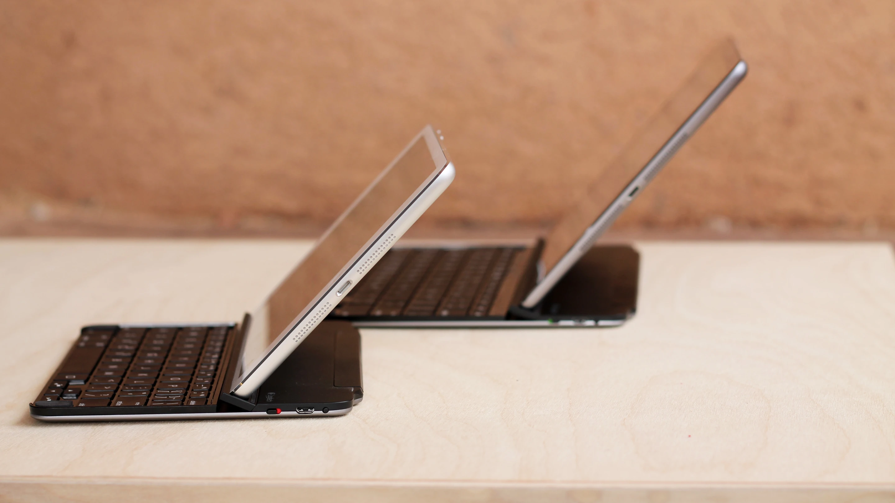 Retina iPad mini (front) and iPad Air, with keyboard covers