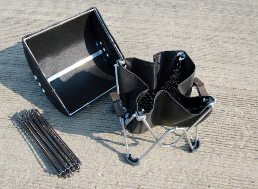 The GoBQ's body and cooking grate fold up to fit in the carry case