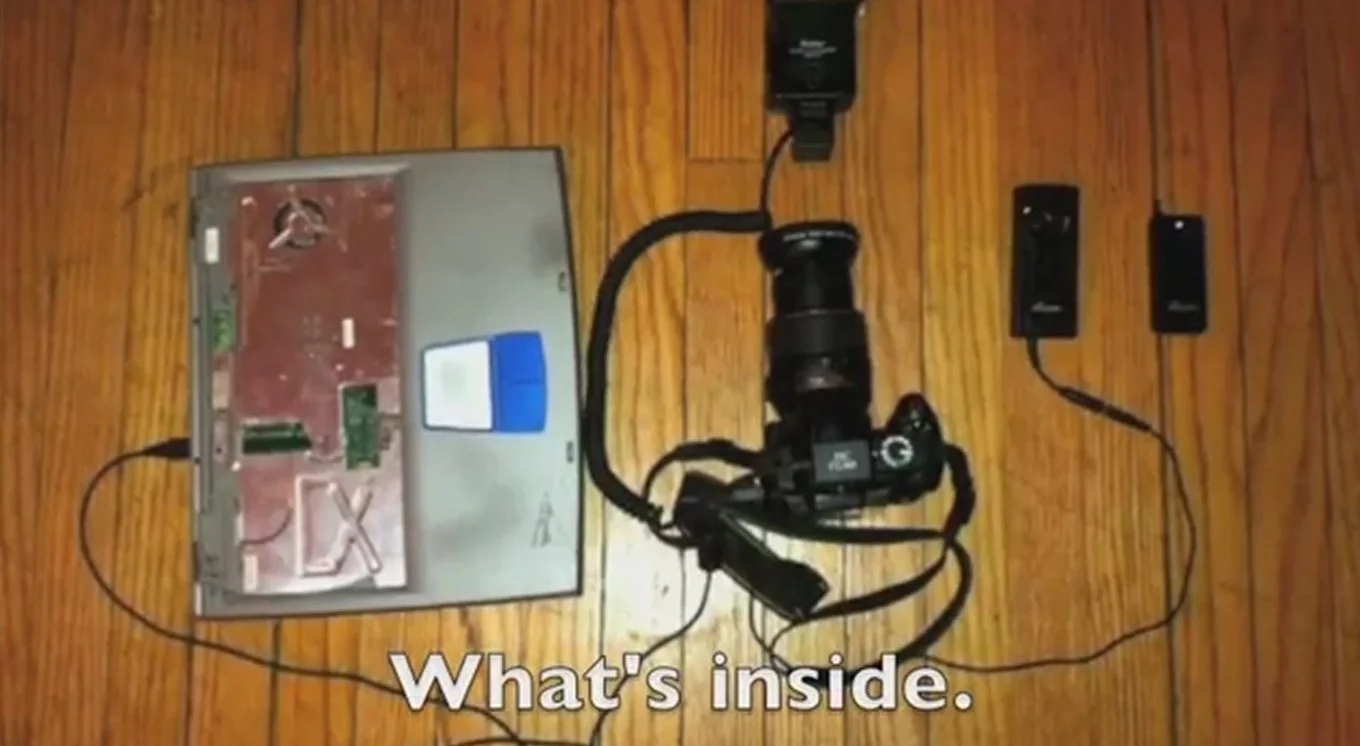 A Nikon D3 is actually responsible for taking the photos - with the body of a sacrificed Dell laptop, a flash unit, and triggering devices making up the remainder of the internals (Photo: Tyler Card)