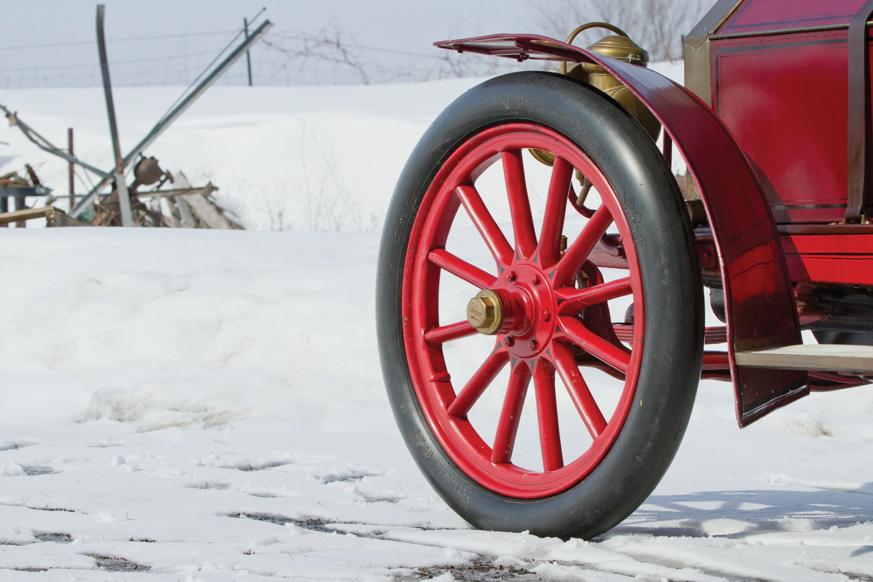 Braking was managed by dual driveshaft brakes, while ultra-skinny balloon tires and12-spoke wooden wheels handled the rest (Photo: Teddy Pieper ©2013 Courtesy of RM Auctions)