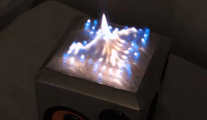 The Sound Torch has a square of small holes on top, which allow gas to escape in various different patterns