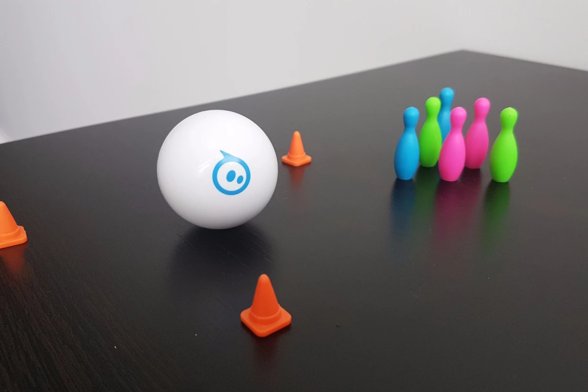 The Sphero Mini comes with a set of traffic cones and bowling pins, to navigate the ball between