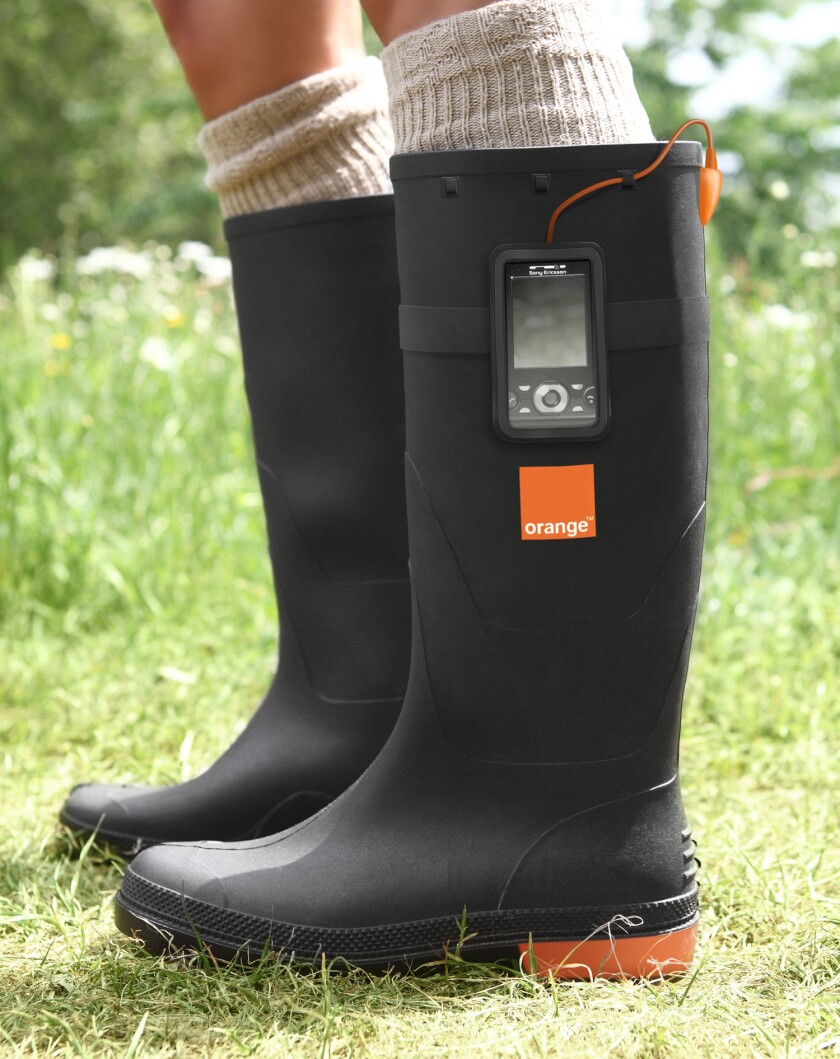 Orange Power Wellies convert heat from your feet into electrical power to charge your handheld