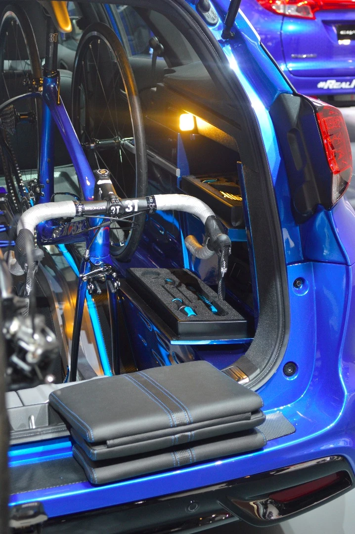 By removing the floor panel on the Civic Tourer's load area, Honda makes room for a bike carrying system
