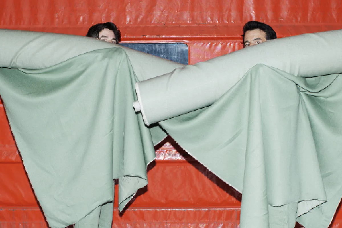Brothers and company co-founders Daniel and Markus Freitag (hard to say which one is which), with rolls of their material