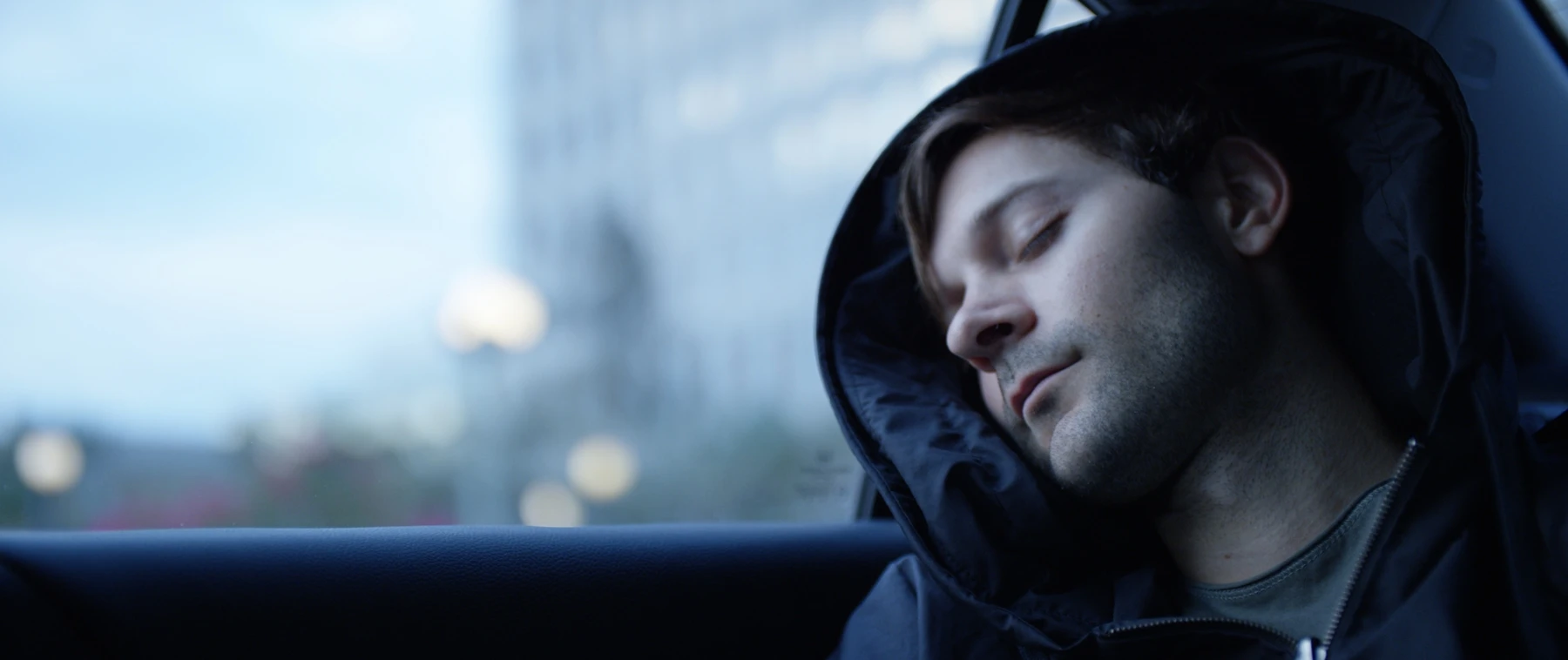 The pillow is formed by an ergonomically designed inflatable unit housed in the hood of the hoodie