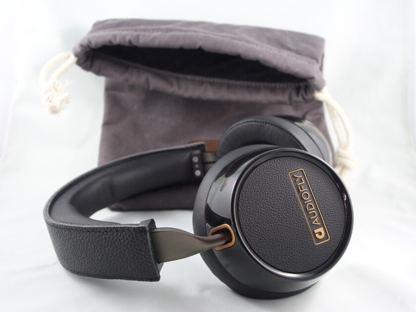 The AF240s ship with a snug waxed canvas carry ba - good for scratch prevention, and not much else