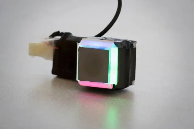 For added precision, the cube-shaped sensor utilizes four differently-colored LEDs