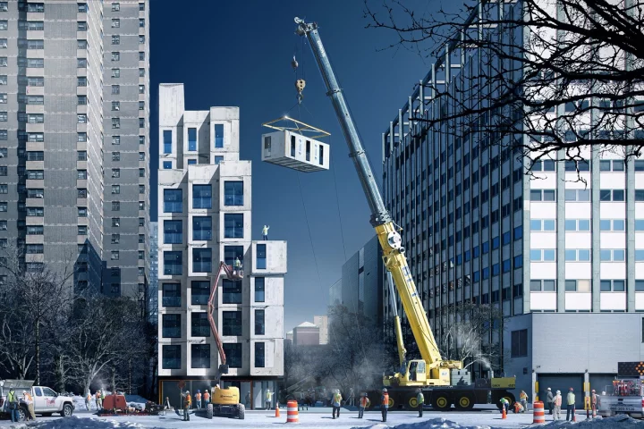The prefabricated modules of My Micro New York are lifted into place individually