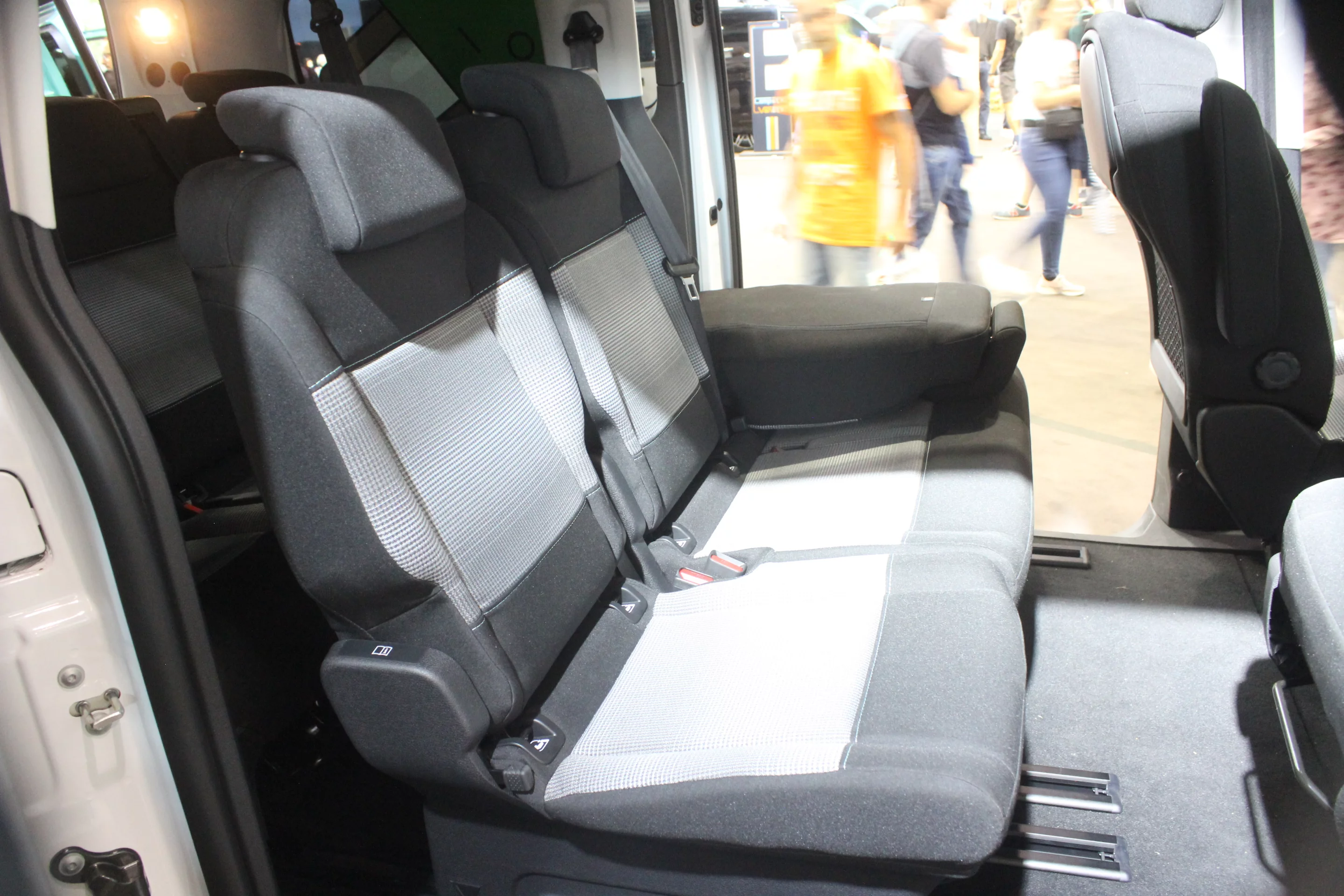 This particular e-Vanster had three rows of seating, a pop-up sleeper roof and a simple fold-out cooking platform with induction cooker