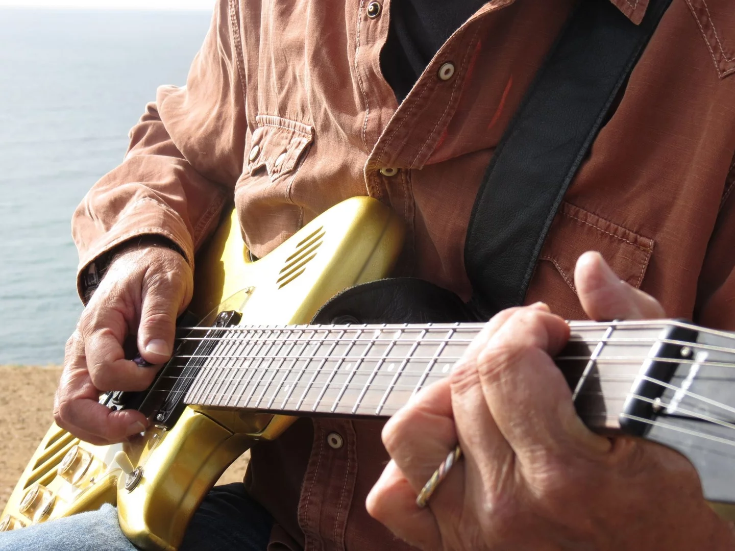 The play anywhere ElectroPhonic Innovations Model One electric guitar