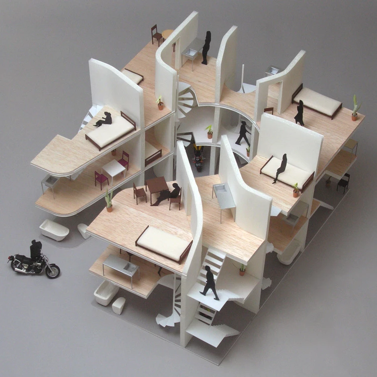 It's tough to describe the interior arrangement because it appears, from the model at least, that no two apartments are the same. Some are larger than others. Some appear to occupy two rather than the full three floors