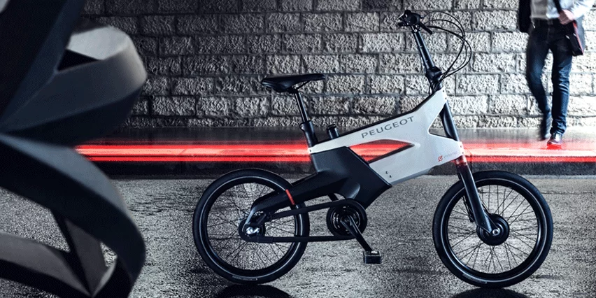 Peugeot's AE21 Hybrid electric bike integrated a lithium-ion battery into its "Clever Case" frame