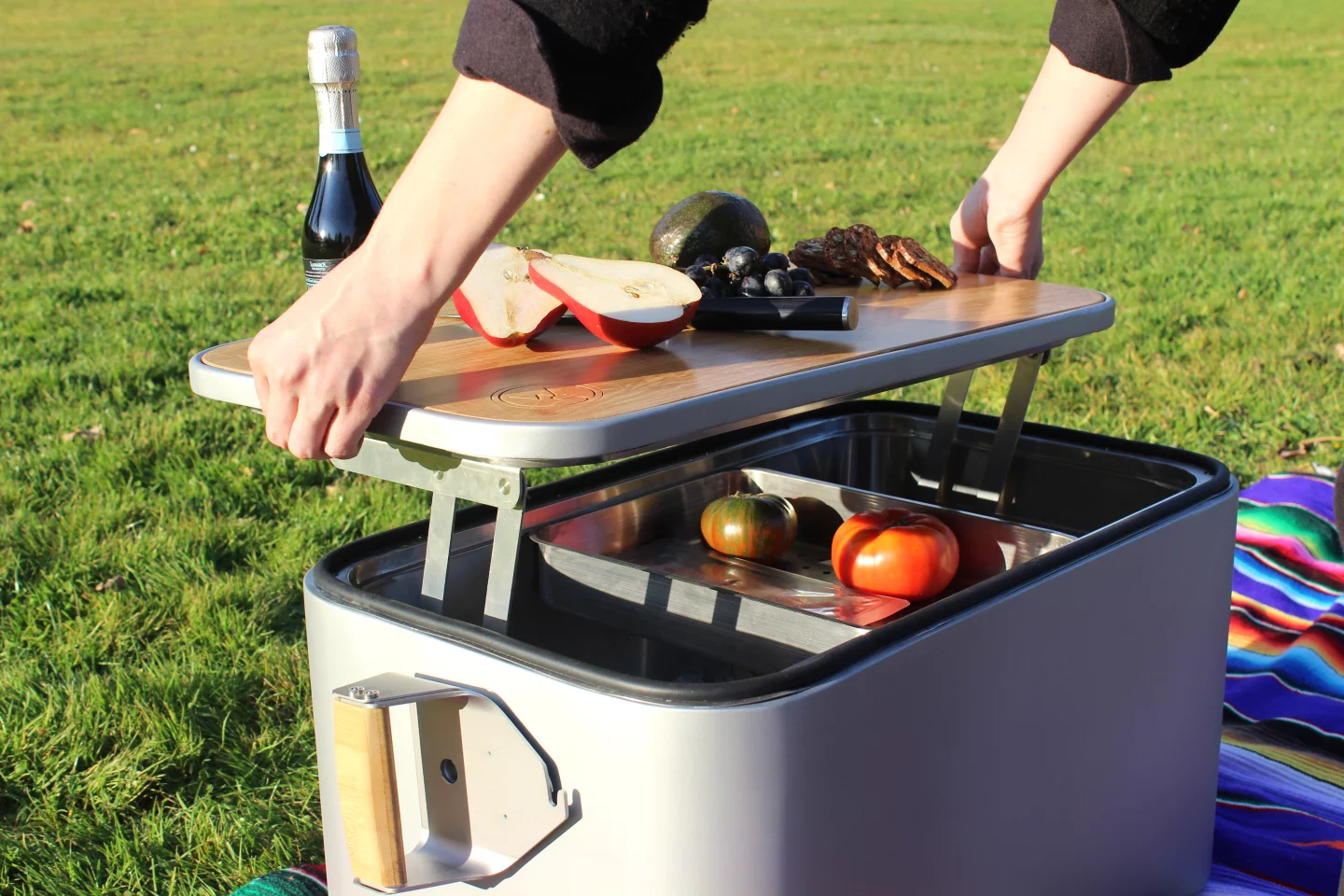 The Wooly cooler features tackle-box-style hinges that allow the lid to effortlessly pop up and away