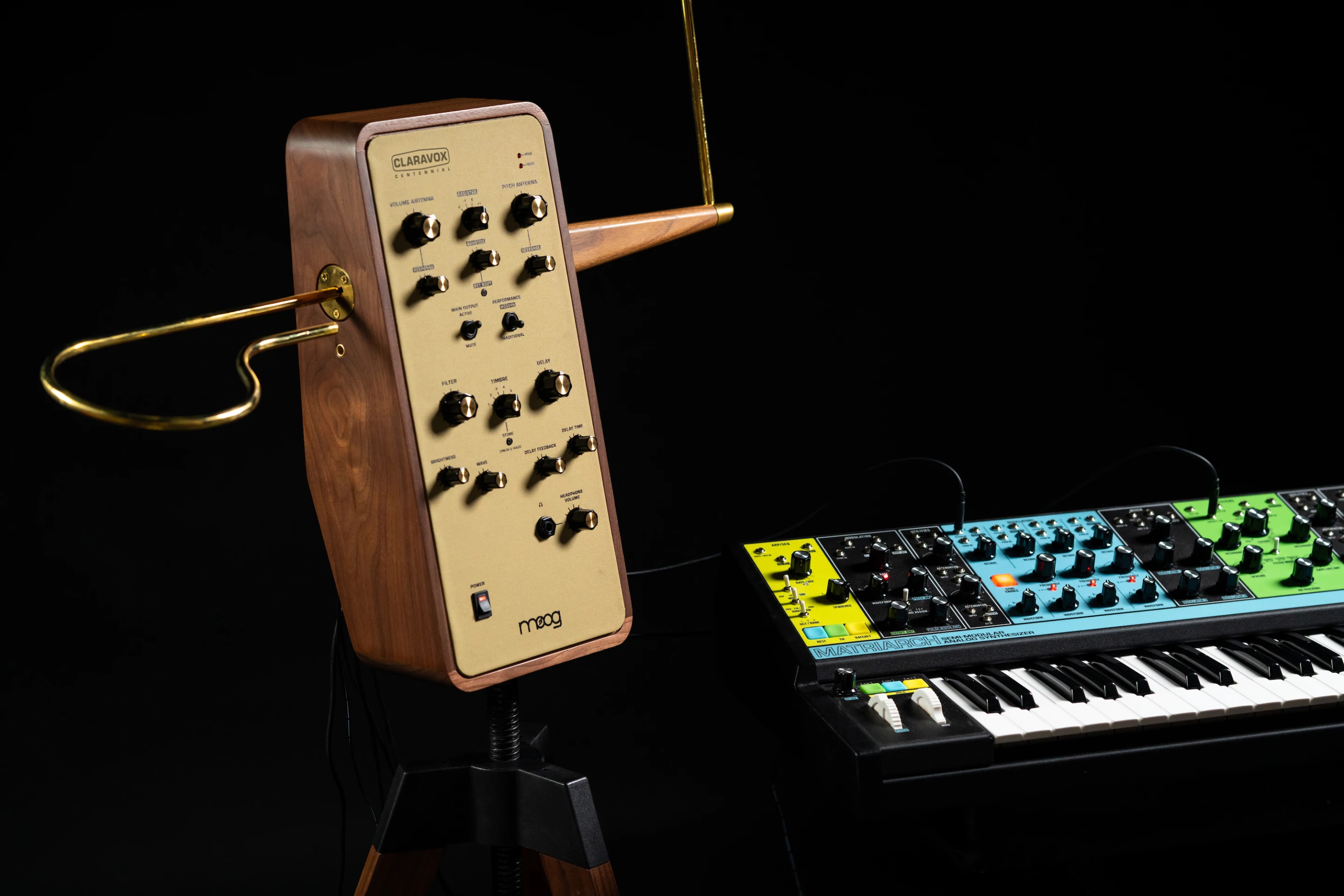The Claravox Centennial features both analog and digital oscillators, brass antennas, a cloth-covered control panel and attractive walnut housing