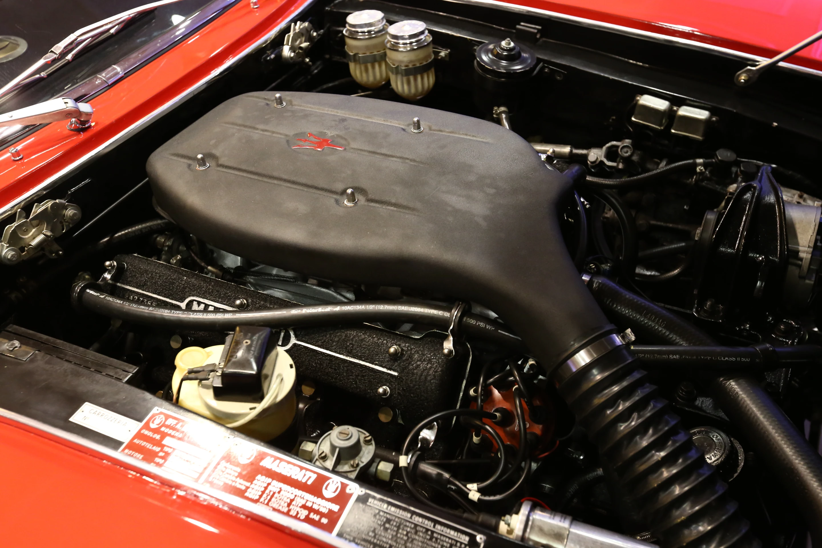 The engine bay of the 1970 Maserati Ghibli Spyder (Photo: Angus MacKenzie/Gizmag.com)