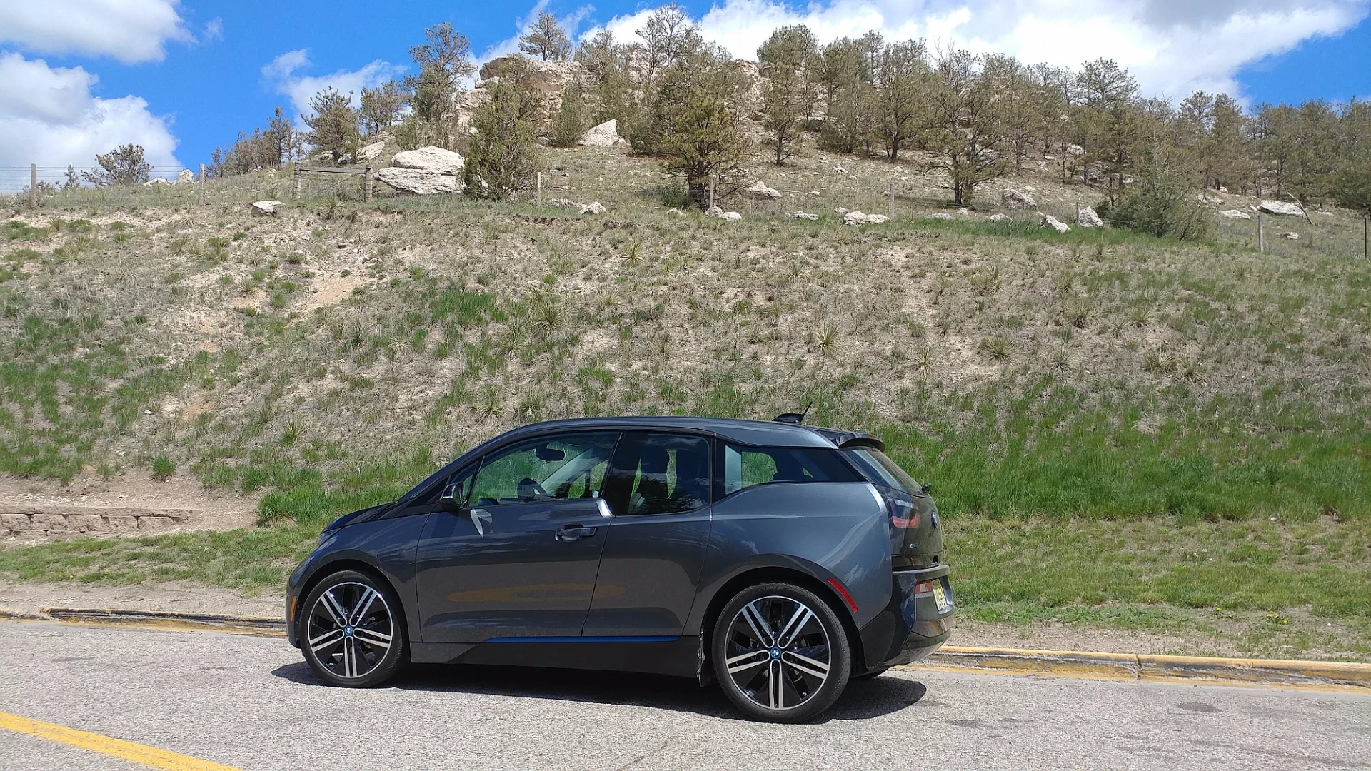 Driving the i3 is actually fun. Unlike many EVs we’ve driven, the i3 has a fast pace to its road feel and a precision to its steering that is all BMW