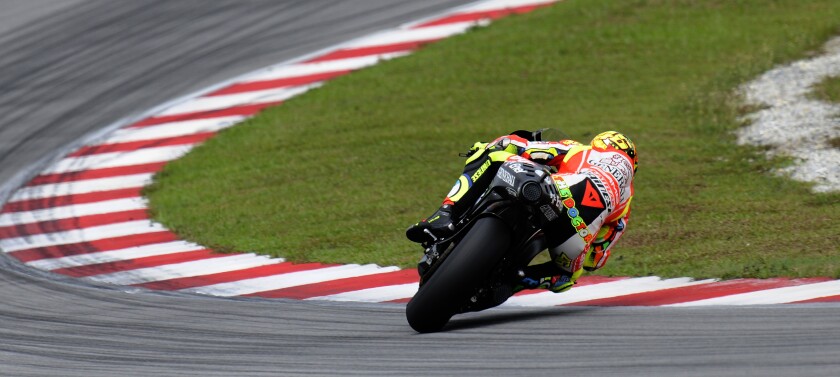 Valentino Rossi gets the Ducati Desmosedici MotoGP bike sideways