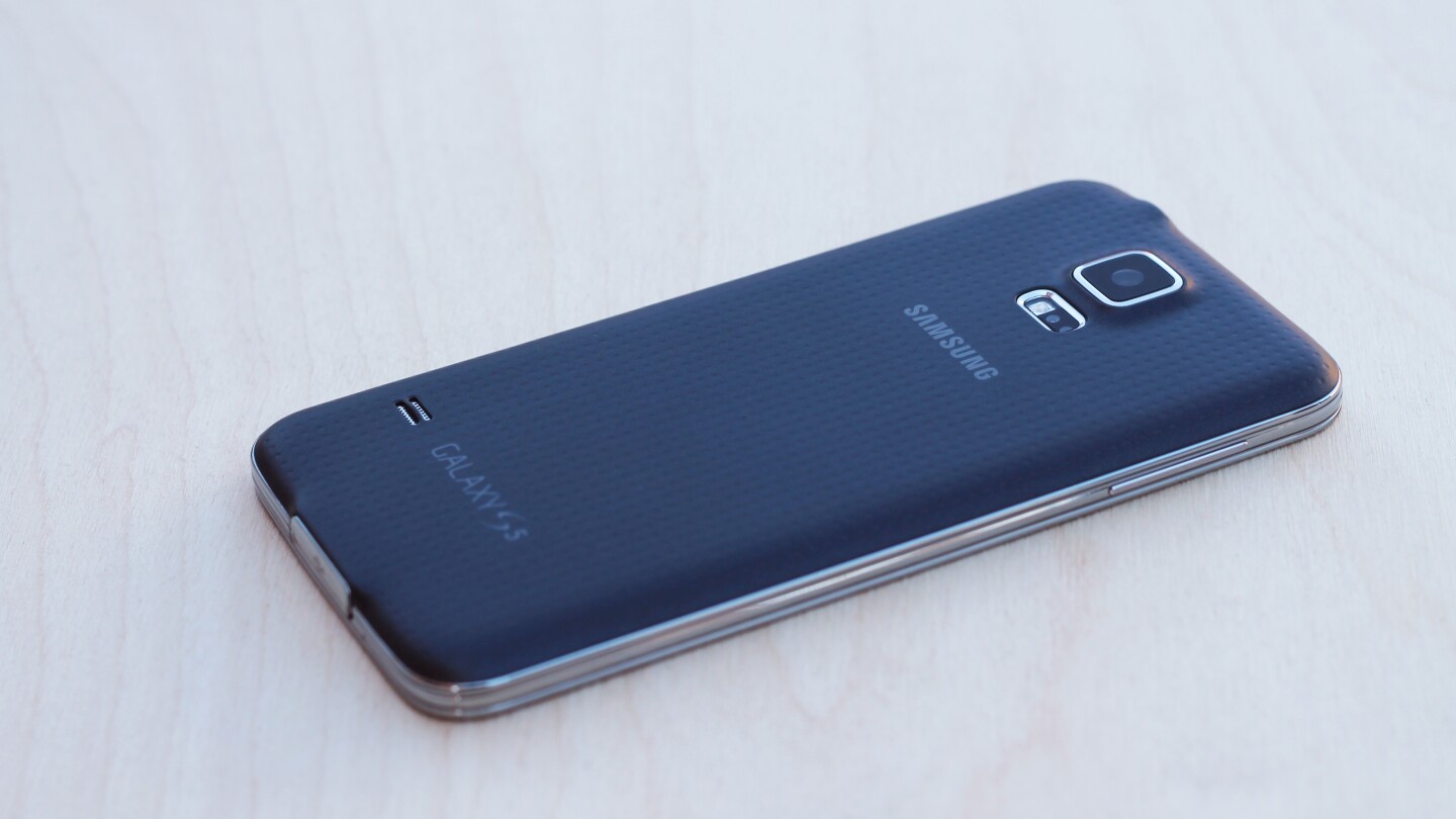 The Galaxy S5 is 142 mm long and 73 mm wide