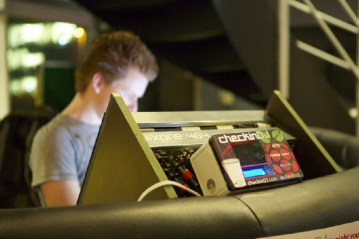 CheckinDJ generates playlists based on the preferences of the crowd